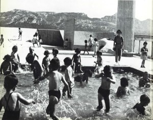 kids splashing in paddling pool